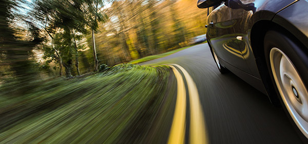 Car Driving Near Painted Line